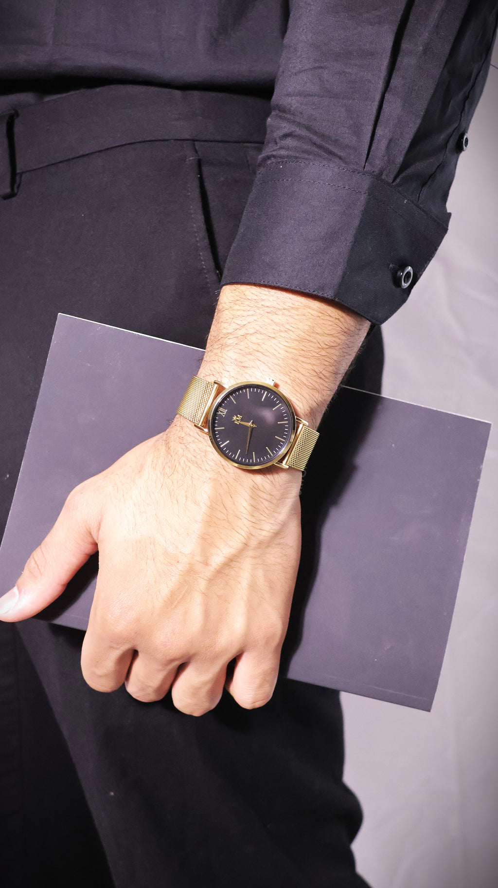 Gold and Black "KM" Watch