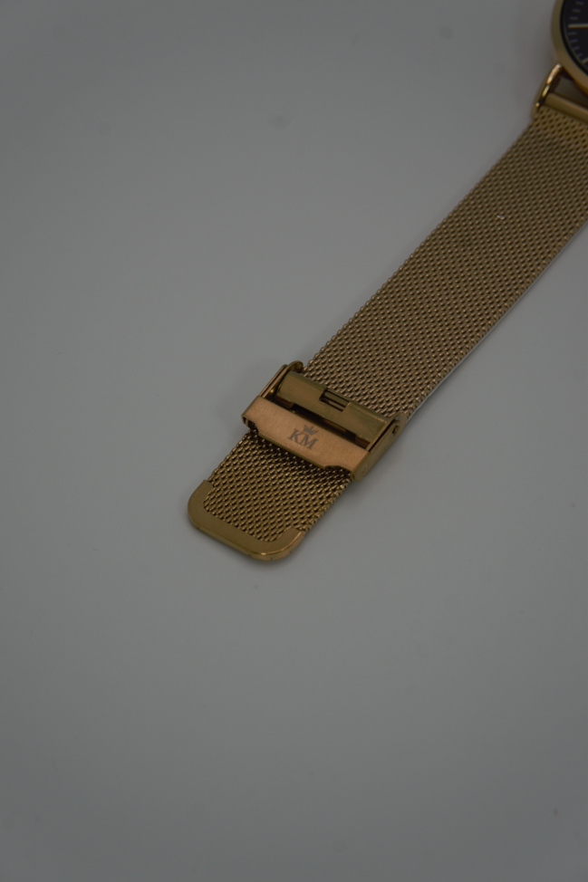 Gold and Black "KM" Watch